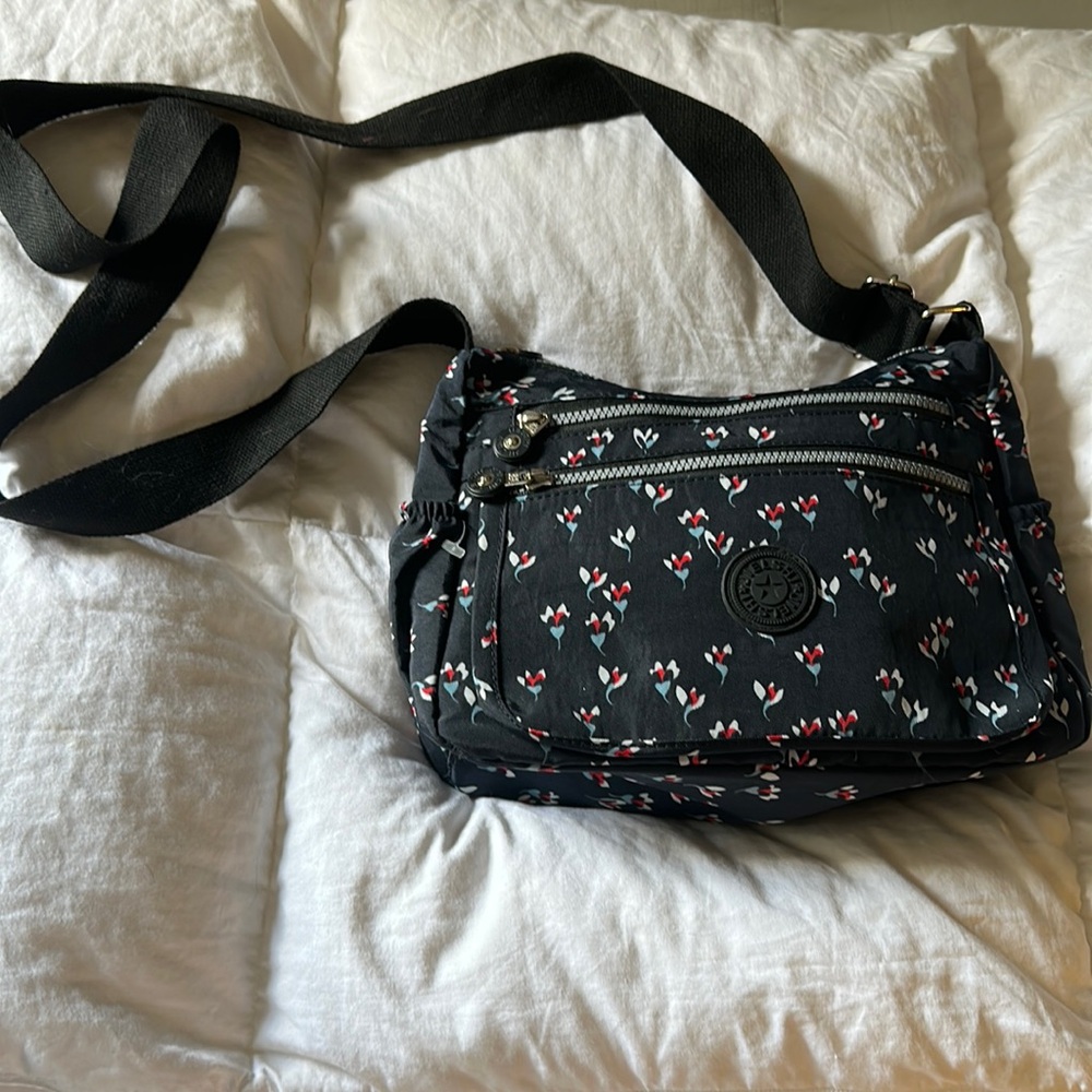 Jielshi nylon cords body navy blue purse floral print very nice lots of pockets